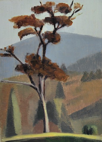 A painting of a fall tree with orange and black leaves with a blue distant hillside behind it. Complementary Colors of Blue and Orange