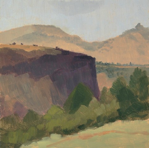 A plein air painting made on a retreat to Central Oregon. Canyons and sage brush. Purple, green and sandy gold colors.