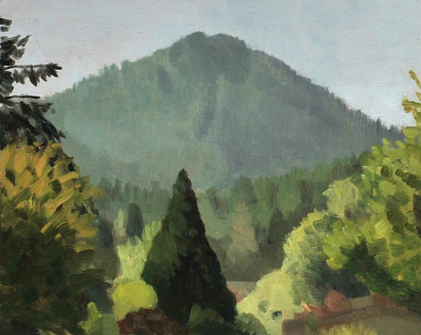 A plein air painting of a butte, pine tree and other trees with a hazy bluish gray sky.
