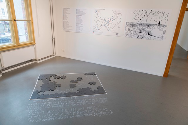 Puzzle with some returned pieces, the map, and the reference drawing. Photo (c) Jaka KieÃŸer 2024.