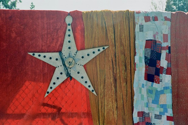 flea market, blankets, star fence, oakland