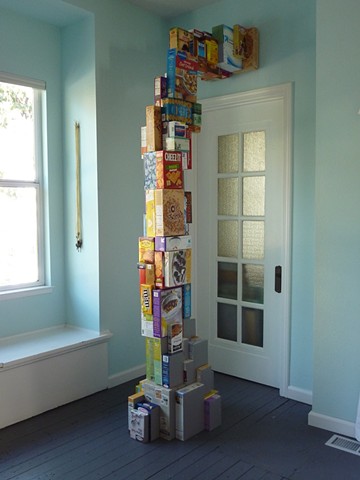 Food boxes stack into an arch shape.