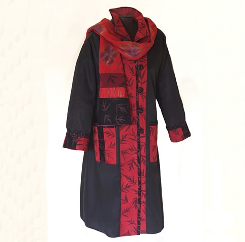 Microfiber raincoat fully lined with flannel backed satin. Trim pieces are cotton. Size med-xlrg