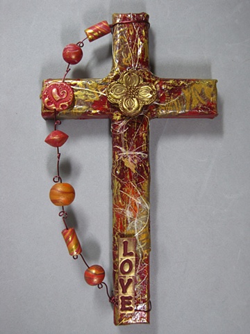 dogwood quatrefoil symbol on collage cross by Nancy Denmark Patti Reed