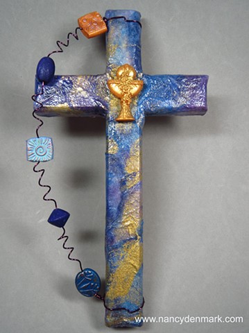 chalice and host symbol on collage wall cross by Nancy Denmark and Patti Reed