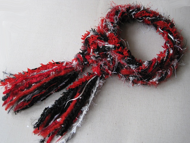 red, black, & white braided yarn boa