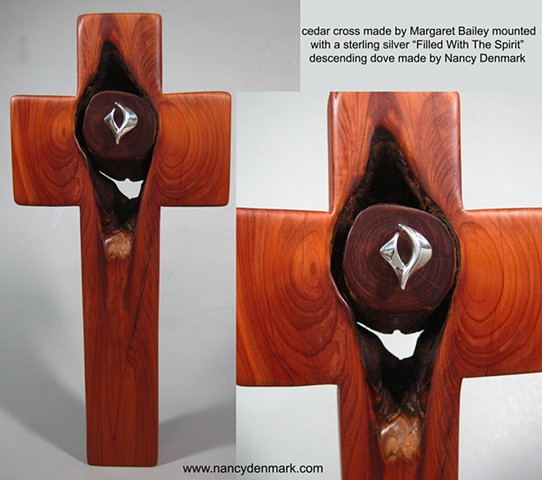 cedar cross with sterling descending dove symbol, a collaboration of wood artist Margaret Bailey & jewelry artist Nancy Denmark