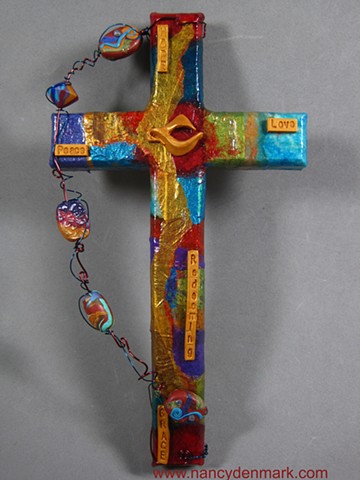 collage and symbol wall cross made by Nancy Denmark & Patti Reed