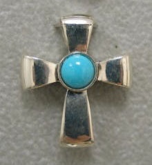 sterling silver ribbon cross with turquoise cabachon by Nancy Denmark