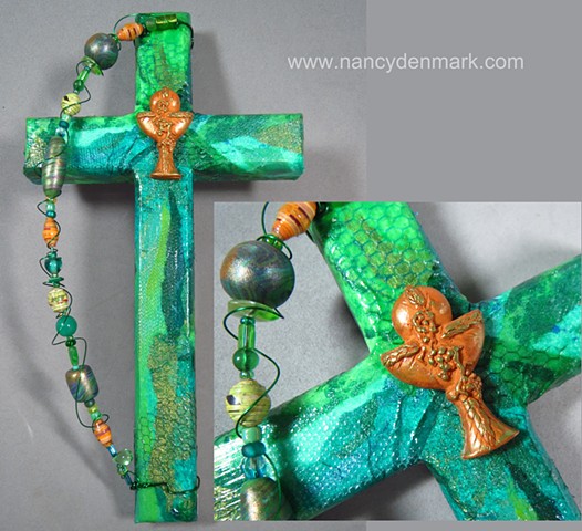 collage and symbol wall cross made by Nancy Denmark