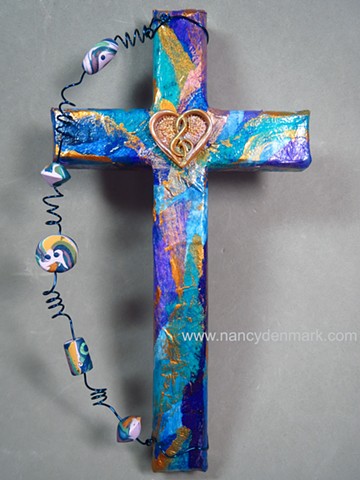 heart with treble clef design on collage wall cross by Nancy Denmark