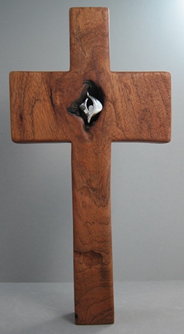 sterling dove design on a mesquite cross made by Nancy Denmark and Margaret Bailey