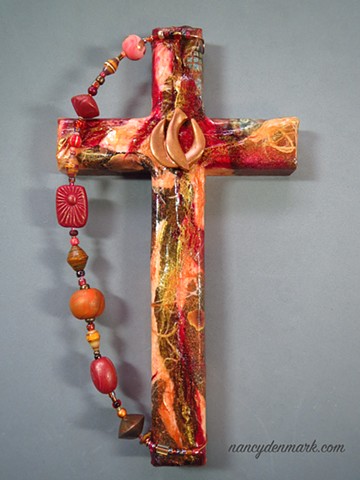 wall cross with descending dove symbolism by Nancy Denmark