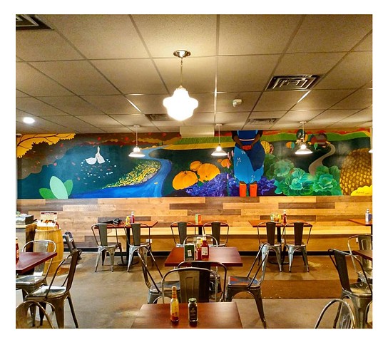 Harvest time mural painted by artist Katlynne Hummell Underhill for the restaurant at New Pioneer Co-op in Coralville Iowa 