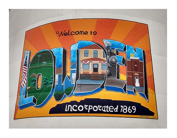 A Postcard mural painted by artist Katlynne Hummell Underhill in Lowden Iowa on an agvantage steel tank.