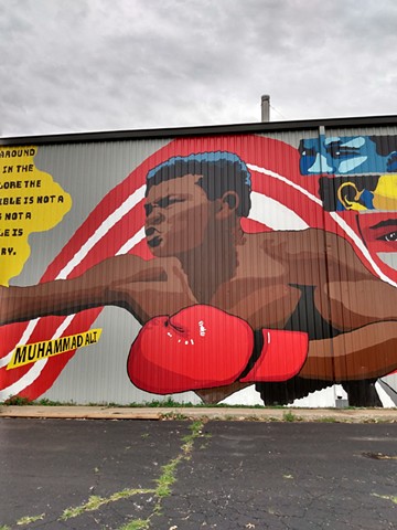 Muhammad ali mural on the side of Icor Boxing in Iowa City, Iowa painted by Katlynne Hummell Underhill. Muhammad Ali. Mural. Muhammad Ali Mural. 