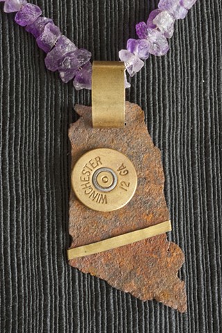 Pendant made with rusty old mining metal and a found shotgun shell by Ryan C Sedgeley.