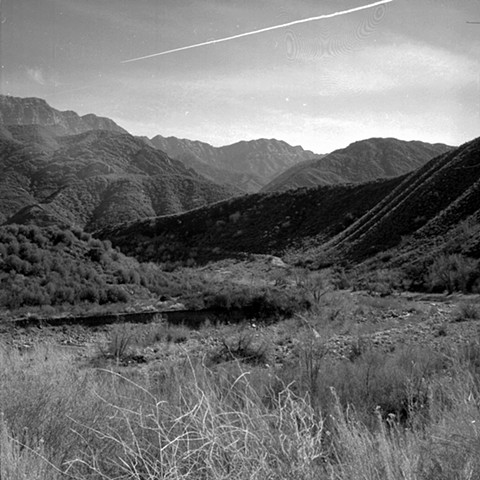 Contrail over Sespe Creek at Ten Sycamore Flat