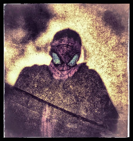 Self portrait -   shadows crack in the sidewalk, wearing a mask 2026