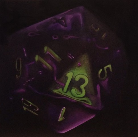 On a square panel, in a dark space, a purple twenty-sided dice (commonly used for role playing games) glows from within. The number 13 is facing the viewer, and illuminated from outside in an eerie green light. 