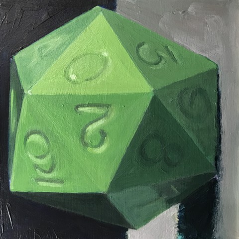 A solid green twenty-sided dice rests on a neutral felted surface, against a black background. The die is not inked, the Arabic numbers are impressions on the faces of the dice. It is illuminated from the right side, as if the light came from over the vie