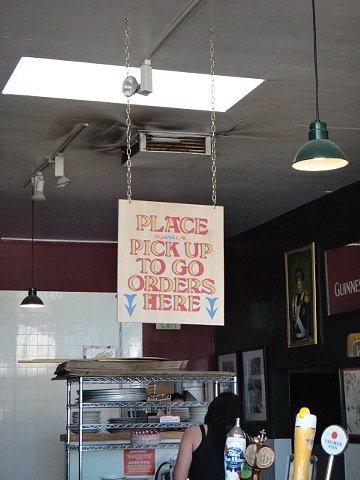 Signage for The Pizza Place