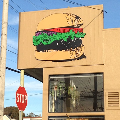 Store front signage for Papa Mak's Burgers