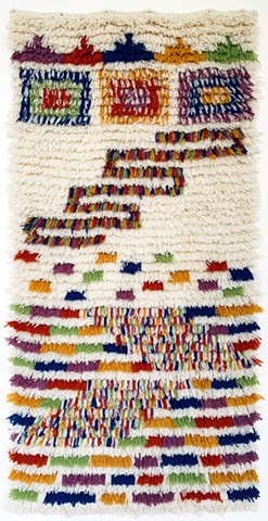 white rya rug with red, yellow, green, lilac, and dark purple pattern