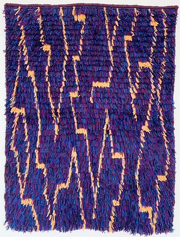 purple yarn rya knot wall hanging with gold zig zag design