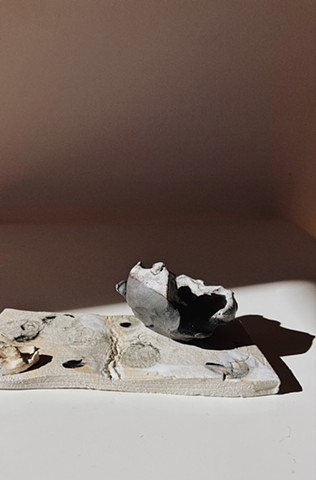 Black clay with white edge salt cellar 