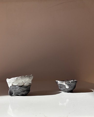 Set of 2 black clay salt cellars 