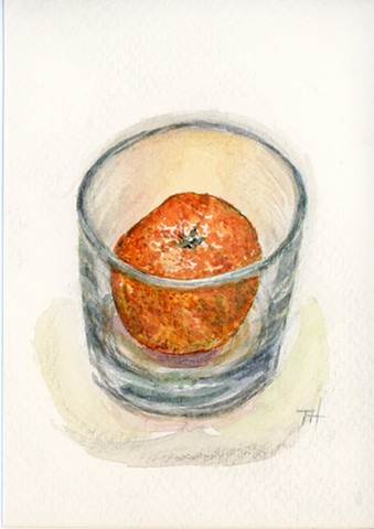 Orange in a shot glass