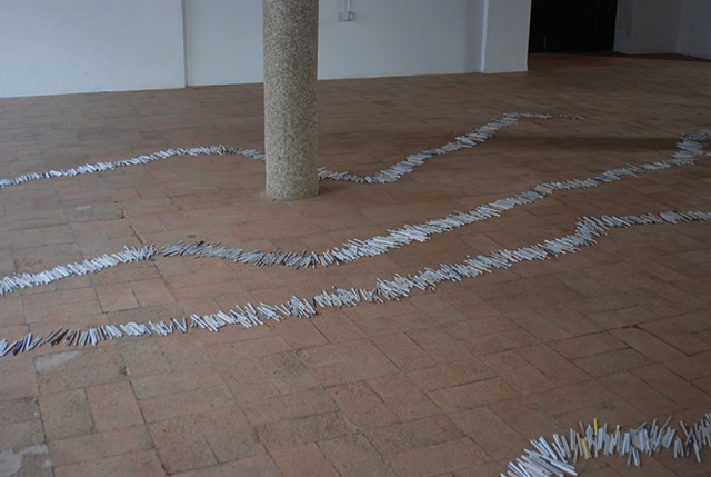 Exhibition Flying Carpet Prayers at El Psito, rolled newspaper from Catalunya in the shape of Caadas Real