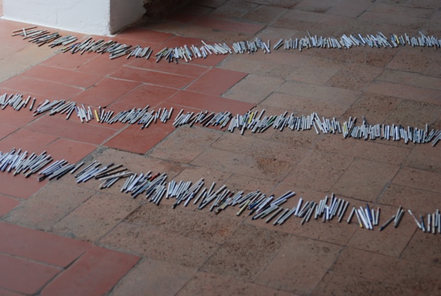 Exhibition Flying Carpet Prayers at El Psito, rolled newspaper from Catalunya in the shape of Caadas Real