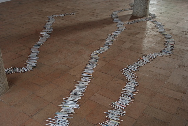 Exhibition Flying Carpet Prayers at El Psito, rolled newspaper from Catalunya in the shape of Caadas Real