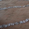 Exhibition Flying Carpet Prayers at El Pósito
On the floor, rolled newspaper from Catalunya in the shape of Cañadas Real