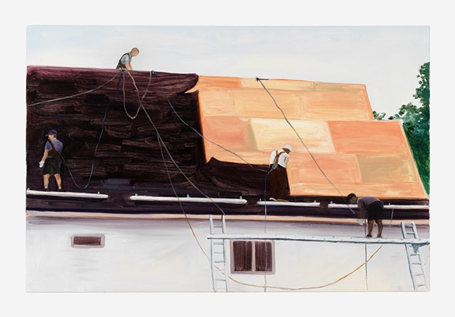 Men putting a new roof on a house