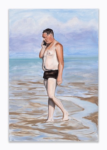 A soft man in a bathing suit at the beach