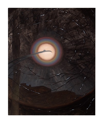 a halo around a street lamp