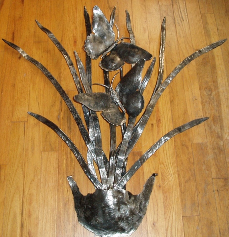 Frolic / wrought iron wall sculpture / SOLD