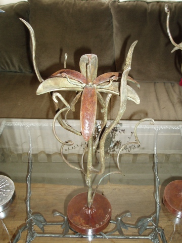 flower sculpture with two tone patina