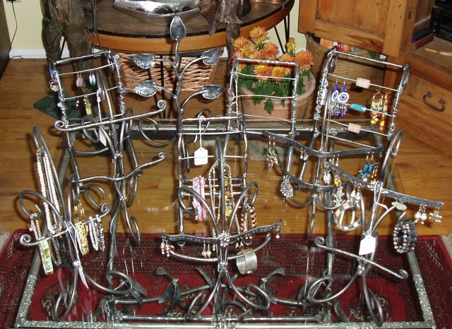 an assortment of jewelry stands