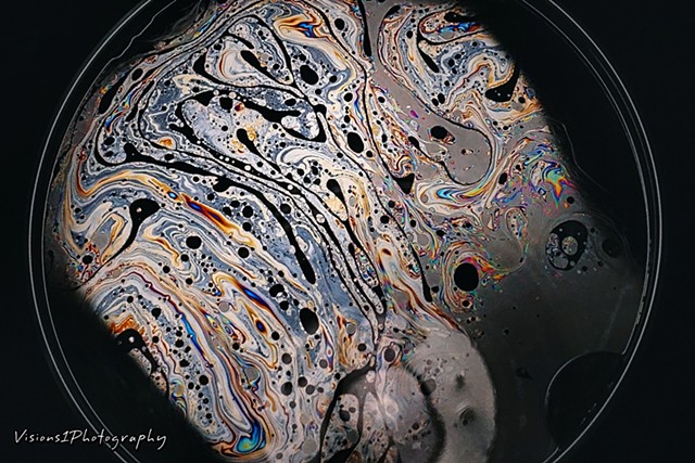 Soap Film on Drinking Glass