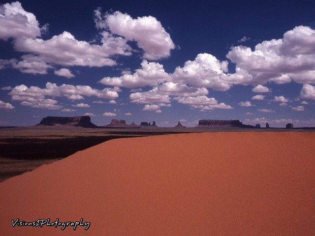 Monument Valley Shot From Behind Sand Dune Arizona