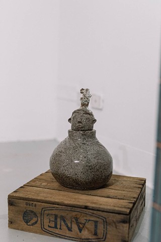 You’ll Never Be Lonely, 2021, gas-fired stoneware sculpture on antique fruit crate