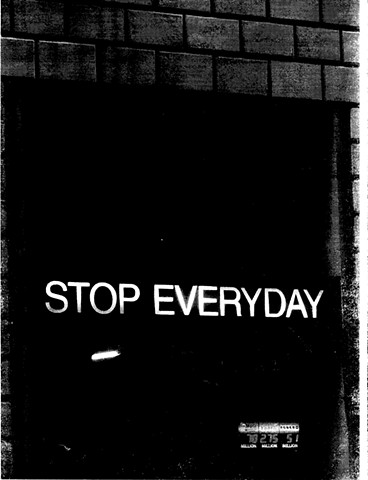 ‘Stop Every Day’ is on a glass window of a brick storefront just above a live L.E.D. mega million lottery sign with a total daily value of seven hundred ten million two hundred seventy-five thousand five hundred ten dollars