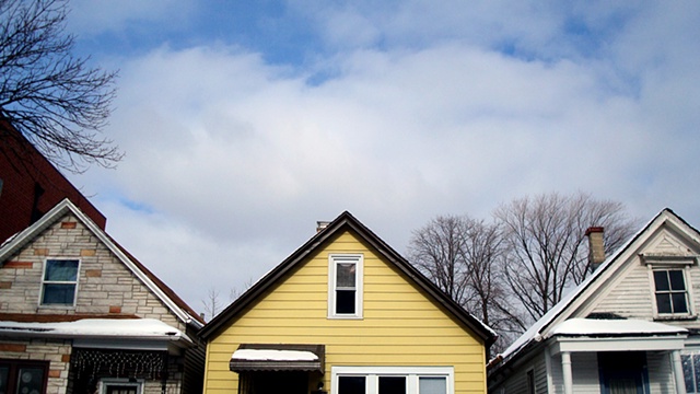 one yellow house in the middle of lyndale