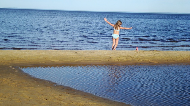 a girl, a soda and lake superior