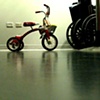 tricycle in the coat check (for william eggleston)