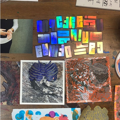 collage preparations on studio table